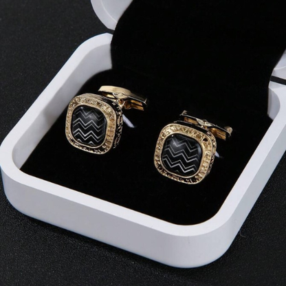 Herrmanschettknapp med gyllene bas och svart mönster